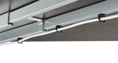 Route cords and protect them from cable snags when you adjust for height with Magnetic Cable Clips