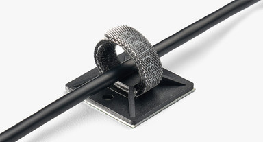 Cable wraps and adhesive cable mounts keep wires bundled and tucked away