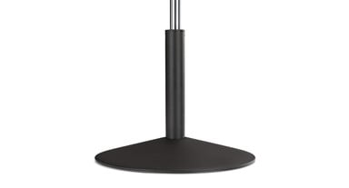 The Crescent Saddle Stool's wide base allows you to stably perch and tilt, keeping the stool upright