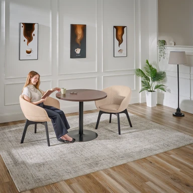 A quiet corner, a good book, and a Rivervue Armchair that makes it worth staying a little longer