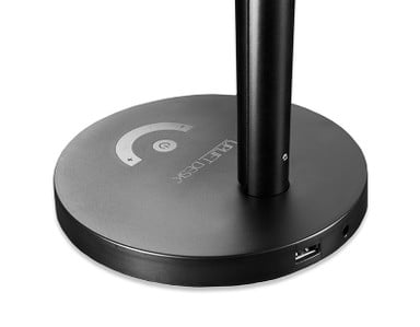 A USB port on the back of the lamp's base provides a dedicated charging station