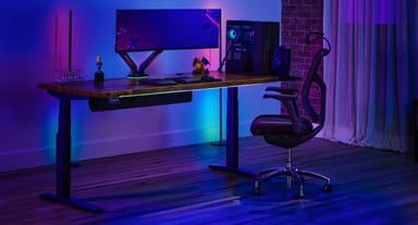 UPLIFT V3 Standing Desk with a Saman Butcher Block desktop and a J3 Ergonomic Chair