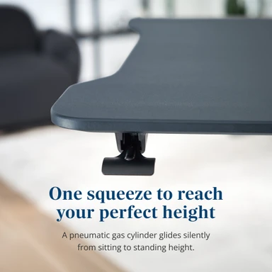 One squeeze of the lever and the Nomad Adjustable Workstation glides to exactly the height you want