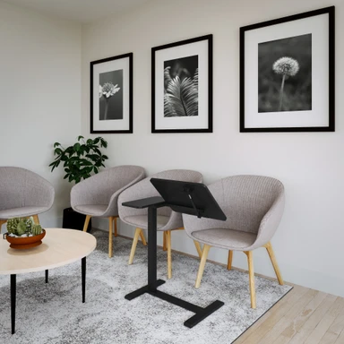 Make the lounge or waiting area a place to get things done with a surface that rolls up beside any seat