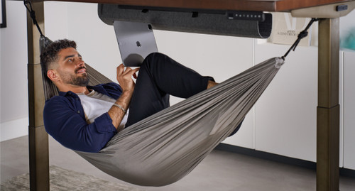 When it's time to kick back and read or relax, just hop into your Under Desk Hammock