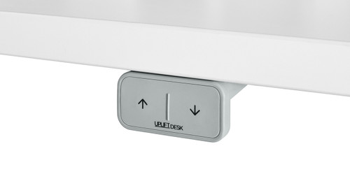 Keypad sits flush with the front edge of the desktop to avoid contact with objects in front of the desktop