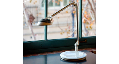 A series of heat-dispersing metal fins keep the lamp cool to the touch and allow the LED to operate at maximum brightness