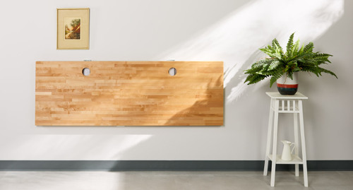 The UPLIFT Floating Desk saves valuable space by folding down and out of the way