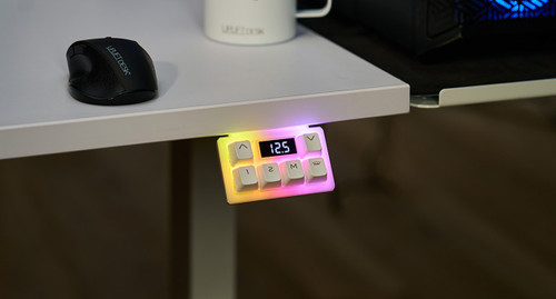 Move your desk to saved sitting and standing heights with a single press of a key on the Advanced RGB Gaming Keypad