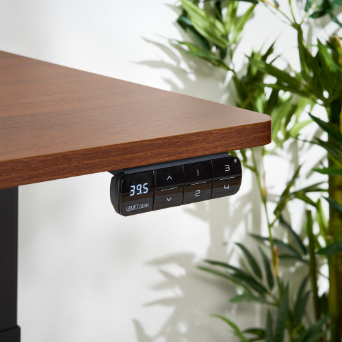 Flush-mounted keypad prevents collisions with objects in front of the desk