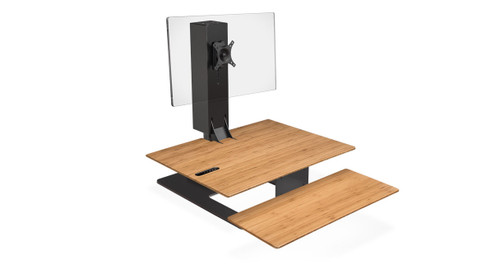 The E7 Electric Standing Desk Converter gets you standing, no matter your current desk setup (Bamboo surface shown)