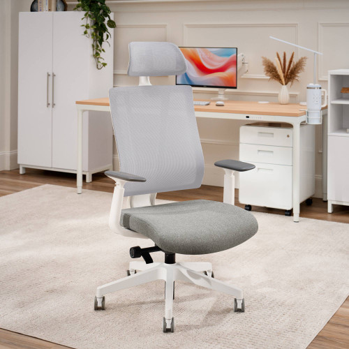 The Clarksville Ergonomic Chair in Fog with the optional height-adjustable headrest