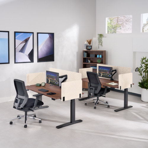 Acoustic privacy panels allow for each workstation to have its own privacy in a shared room