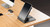 Base supports devices up to 15" wide