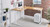 A White Oak L-Shaped desktop and white frame coordinate with UPLIFT Desk accessories