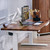  A home office with an UPLIFT 2-leg Standing Desk and Crestview Single Monitor Arm in white