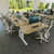 Crestview Single Monitor Arms mounted to 60" x 30" Maple Laminate Standing Desks