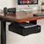 Shelf can fit laptops or other personal items up to 13" x 13"