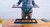 Slide tab to unlock and lift