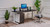 Modern home office showing a filing cabinet with gray drawer fronts positioned under an UPLIFT Standing desk