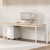 The Parsons Standing Desk in white with a Maple Laminate desktop adds warmth and modern style to any office