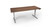 Our T-frame feet maintain a symmetrical design that feels comfortable for users on either side. (Pictured: 80" x 30"  Walnut GREENGUARD Laminate)