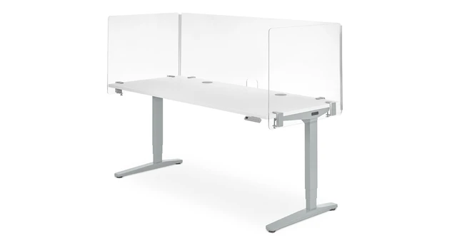 A white desk with two modesty panels, a long rectangular tabletop, and two metal legs with a slight angled base