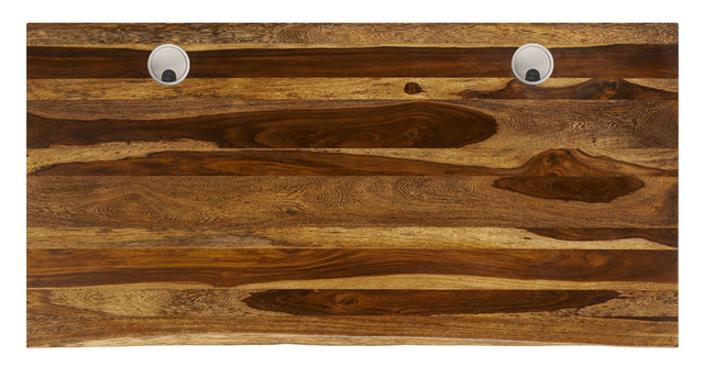 A wooden plank wall with two metallic round floor outlets protruding, showing natural wood grain and warm tones.