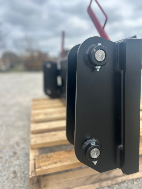 Washburn Company makes a Ford 7210/7310//7410 series to universal skid steer. This conversion will pin directly on to your Ford 7210/7310//7410 series loader. Comes with all new 1" pins and allow you to use any skid steer equipment directly from your Ford tractor. The Ford 7210/7310//7410  plates are cut 3/8" grade 50 plate and can be upgraded to 1/2" plate for $200.00. The unit will come powder coated Ford blue and features safety red handles. Stop in today at 172 NE 1st Ln. in Lamar, Mo USA or call us at 800-283-7107 to get in line for your new easier quick attach system.