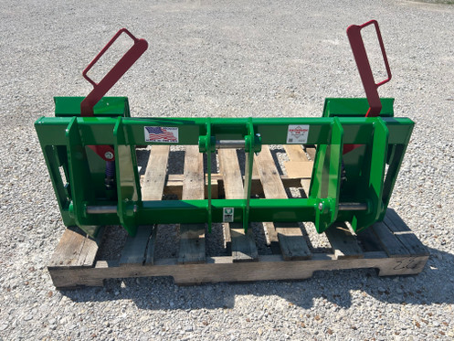 JD 143 Loader to Skid-Steer Attachment Adapter
Two crossbar design keeps the face of thee latch boxes in line and keeps them from twisting and going out of alignment.
Latch box sides are 1/2" thick and are made from grade 50 plate for added strength.
The latching pins are designed so that when the latches are closed the springs are bottomed out so that the pins cannot come unlatched.
Bushing for pins
Grease Zerk in both latching pin tubes
Couples the two different Quick hitches as close as is physically possible for maintaining maximum lifting capacity.
Quick attach adapters are also available for tractor loaders with pin on buckets to convert them to quick attach.

