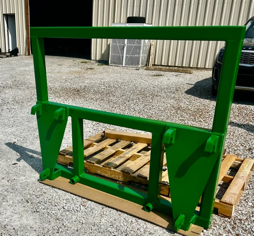 Hay Mover John Deere H480 2- 48" Spear w/ Topper, hay spear for john deere h480 loader, tractor bucket bale spear, tractor bucket bale
spike, hay spear for john deere loader, hay spears tractor, bale spear for implement,
loader hay spear . Adapts to JD H480 series (Euro, Global attach). JD H480 also known as a EURO 2. John Deere H480 2 hay spear round or square bale hay mover. Bale spikes rated at 1500 a piece, 3000# together at a 30" center. Built standard with cross bolt style bale spears. Your choice of bale spear at checkout, 33", 39" or 48".