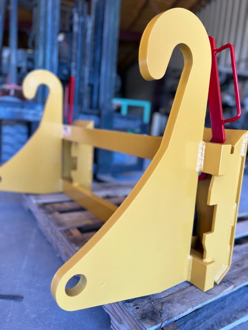 Adapts to John Deere 310 SG series quick attach style. Converts John Deere 310 SG attachment to any standardized universal skid steer equipment. 7000# Rating. This two crossbar design keeps the face of thee latch boxes in line and keeps them from twisting and going out of alignment. Latch box sides are 3/8" thick and are made from grade 50 plate for added strength.
