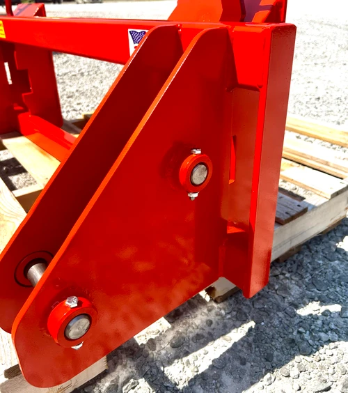 Converts a Pin On Kubota LA 1154 to use standardized skid steer equipment. The latching pins are designed so that when the latches are closed the springs are bottomed out so that the pins cannot come unlatched. Grease Zerk in both latching pin(please grease prior to use)  (tubes for an additional $60).