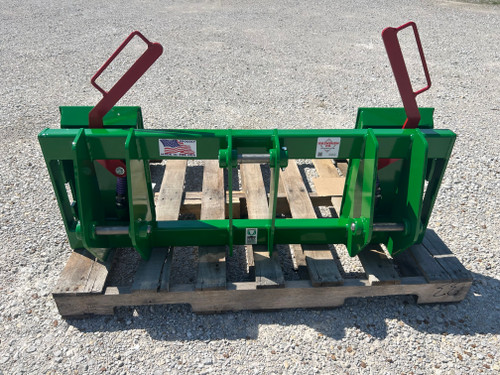 JD 143 Loader to Skid-Steer Attachment Adapter
Two crossbar design keeps the face of thee latch boxes in line and keeps them from twisting and going out of alignment.
Latch box sides are 1/2" thick and are made from grade 50 plate for added strength.
The latching pins are designed so that when the latches are closed the springs are bottomed out so that the pins cannot come unlatched.
Bushing for pins
Grease Zerk in both latching pin tubes
Couples the two different Quick hitches as close as is physically possible for maintaining maximum lifting capacity.
Quick attach adapters are also available for tractor loaders with pin on buckets to convert them to quick attach.

