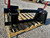 Washburn Company has made a New Holland and Ford 445 to universal skid steer conversion. This adapter is made with 3/8" or 1/2" NH/FORD 445 brackets. Washburn Company makes our skidsteer latchbox plates out of 3/8" or upgraded 1/2" plates for anything over 7500#.  PIN ON New Holland/Ford 445/445D to convert to standard skid loaders
Replaces original attachment hitch hookup with Standardized skid steer or skid loader hookup.
Heavy duty construction throughout.