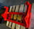 Adapter for a quick attach style Kubota 1251 quick attach to Bobcat hitch. Converts Kubota loader to standardized skid-steer. 