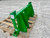 JD 143 Loader to jd 500
Two crossbar design keeps the face of thee latch boxes in line and keeps them from twisting and going out of alignment.
Latch box sides are 1/2" thick and are made from grade 50 plate for added strength.
The latching pins are designed so that when the latches are closed the springs are bottomed out so that the pins cannot come unlatched.
Bushing for pins
Grease Zerk in both latching pin tubes
Couples the two different Quick hitches as close as is physically possible for maintaining maximum lifting capacity.
Quick attach adapters are also available for tractor loaders with pin on buckets to convert them to quick attach.
