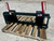 Washburn Company has fabricated from start to finish a Ford 7109 which is similar to all fords in this classification. The Ford 7109 features 3/8" plates with 3/8" skid steer boxes, triple passed and welded. All new 1 1/4" pins with DOM bushings and 3/8" handles. Washburn company makes several fords including but not limited to: Ford 7109,7108, 7209, 7309, 210, 7310, 7410 and 7414. Contact us today at 800/283-7107 for more details on our ford, skid steer and other factory builds. 
