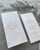 white wedding menu with gold monogram