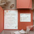 Sample of burnt orange pocket invitations