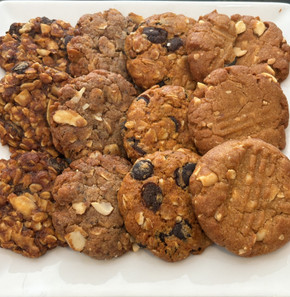 Assortment of Almond Nut, Cowboy, Oatmeal Chocolate Chip, and Peanut Butter Cookies