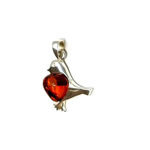 A stunning bird pendant crafted in sterling silver, accentuated by a captivating Baltic amber gemstone breast