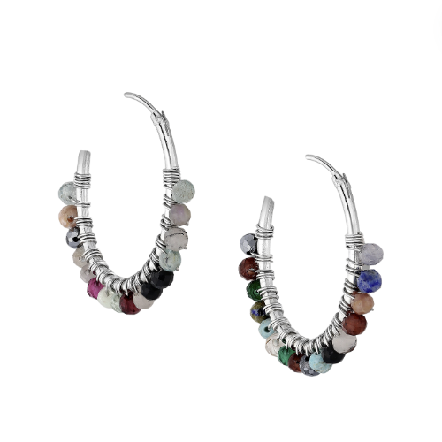 Stunning 925 silver hoops adorned with beautiful gemstones. Perfect for adding a touch of elegance to any outfit.