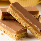 Millionaire's flapjack bars with golden oat base and smooth chocolate topping