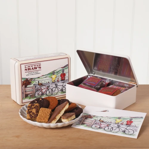 Lottie Shaw's Cyclist Treat Tin - illustrated tin filled with Yorkshire biscuits, flapjacks and shortbread