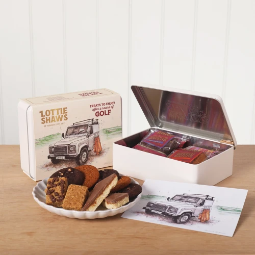 Lottie Shaw's Golf Treat Tin - illustrated tin filled with Yorkshire biscuits, flapjacks and shortbread