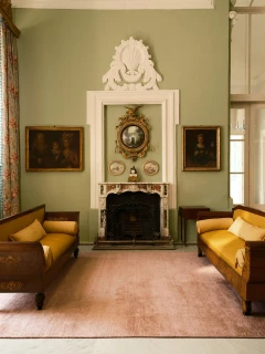 The Rug Company Vara rug, Clay colourway, handloomed silk-wool blend, in a designer interior