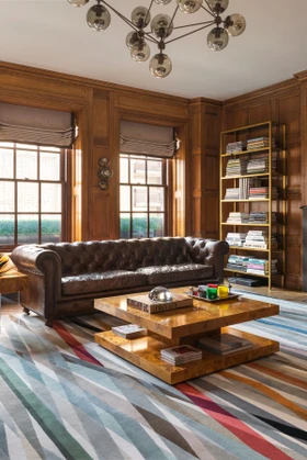Carnival Round Rug by Paul Smith - rug in a living room