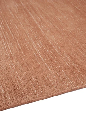 Vara rug in Terra, corner detail showing pile texture