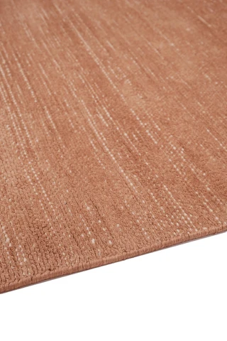 Vara rug in Terra, corner detail showing pile texture